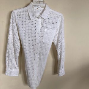 White eye let blouse. Long sleeves.